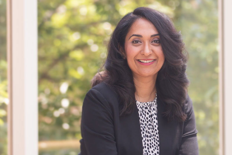 Parimala Prahalad smiling at the camera.