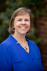  Ann Gleason wearing a blue shirt
