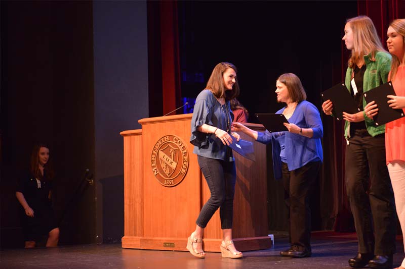 Student recieving CSA Award