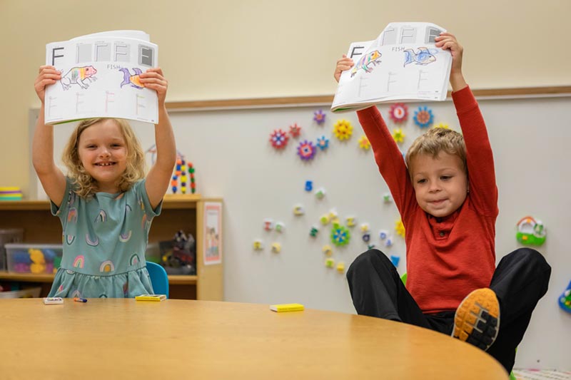MAP Classroom children showing spelling project