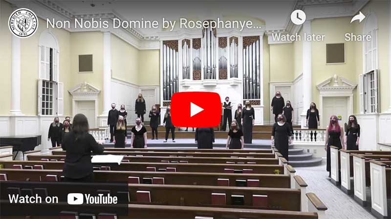 A music concert in a beautiful indoor church.