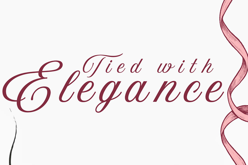 ribbon showing on the left with text centered that reads Tied With Elegance